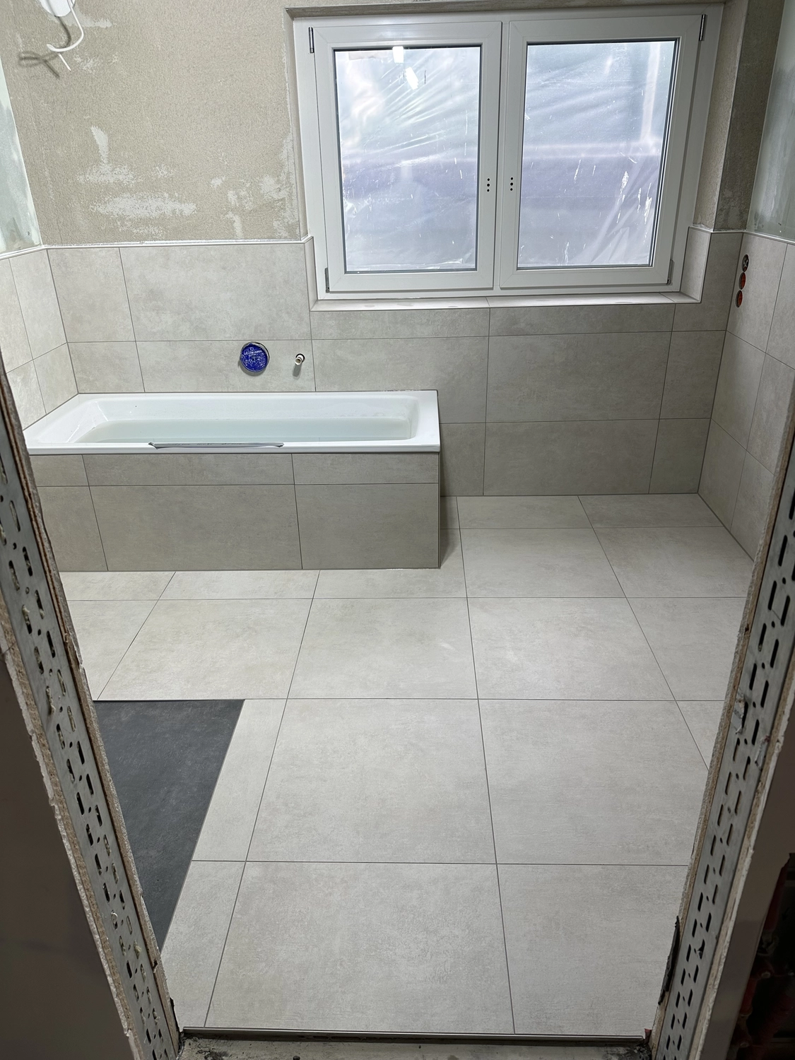 Vellaro Bäder & Räume - Spachtel- und Fliesenarbeiten - Bodenfliesen