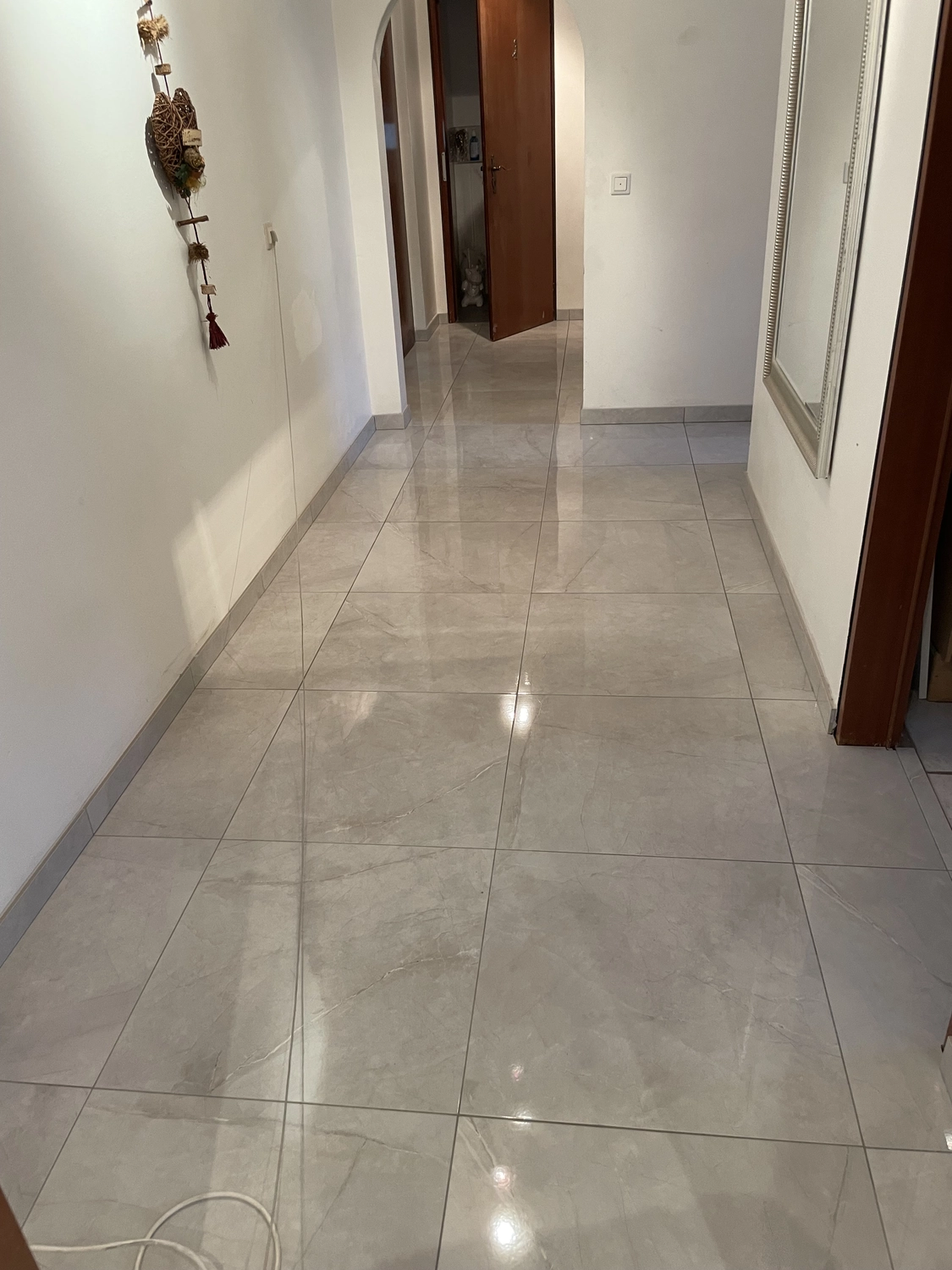 Vellaro Bäder & Räume - Spachtel- und Fliesenarbeiten - Bodenfliesen